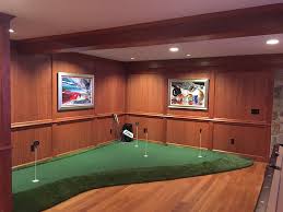 For the climbing enthusiast, a rock wall can be installed. Golf Rooms The Ultimate Golf Man Cave