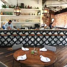 Black And White Restaurant Floor Tiles Update Your Tuscan Style Home With Tips From A Popular California Restaurant Designed Tuscan Style Homes Tuscan Style Mediterranean Home Decor