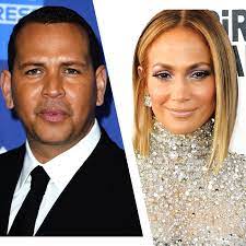 The first image we see is a framed photo of j.lo and arod at a 2020 nye party P1 Rsa8yt2bvvm