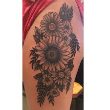 A tattoo on the ribcage. 225 Stand Out Sunflower Tattoos With Meanings Tips Prochronism