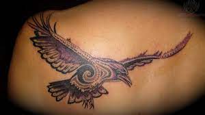 This is a dead tribal crow design that looks. Tribal Crow Tattoo On Back For Men Tattoos For Guys Tribal Tattoos For Men Crow Tattoo