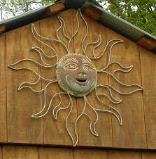 Sun Motif On The Garden Shed Moon Stars Art Sun Moon Stars Garden Rock Art