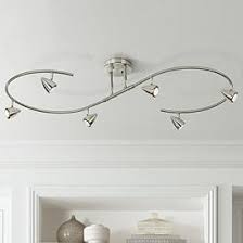 Track and spotlights are an endlessly adjustable lighting option. Modern Track Lighting Stylish Contemporary Track Lights Lamps Plus