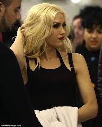 What A Transformation Gwen Stefani Looks The Perfect Lady In Sophisticated Cream Coat After Frenzied No Doubt Gig In Paris Gwen Stefani Style Gwen Stefani Gwen Stefani And Blake