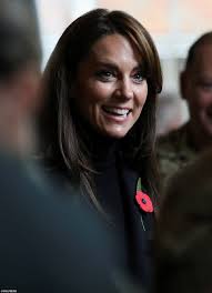 Kate Middleton dons camouflage gear to drive an armoured vehicle around  Norfolk barracks