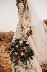 A Customized Modest Wedding Dress With Long Sleeves From Alta M In 2020 Modest Long Sleeve Wedding Dresses Modest Wedding Dresses With Sleeves Boho Chic Wedding Dress
