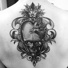 For example, the sugar skull tattoo exemplifies the soul or afterlife as a celebration of and tribute to lost loved ones. Love Heart Skull Tattoo Novocom Top