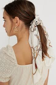 Here's how to wear a scrunchie with short hair and achieve a sleek low pony: Lana Silk Scarf Scrunchie Scarf Scrunchie Silk Scarf Hair Scarf Hairstyles