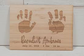 The Cutest Little Way To Save Our Son S Handprints Laser Engraved In Wood And Hand Lettered With His Bir Laser Engraved Ideas Wood Laser Ideas Laser Engraving