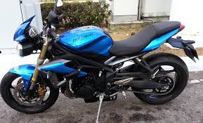 Motorcycles that deliver the complete riding experience. Motorcycle Review Triumph Street Triple The Legend Of A Blue Triumph Concurring The Street Of Kl The Road To Heaven