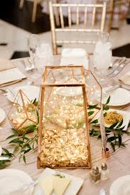 Library Chic Should Definitely Be The Latest Wedding Theme Lantern Centerpiece Wedding Wedding Table Centerpieces Wedding Centerpieces