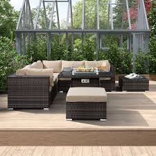 There is plenty of space to dine using the table, but the fire pit adds something special to the. New Lay Down Patio Rattan Sofa Corner Sofa Fire Pit Inside Table China Living Room Furniture Fabric Sofa Made In China Com