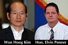 2 senior immigration officers