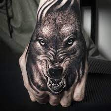 Pin By Sabrina Carlsen On Forearm Hand Tattoos Hand Tattoos For Guys Wolf Tattoos Men Wolf Tattoo Forearm
