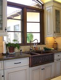 Ceramic sinks are traditional, yet can look the part in a contemporary setting when styled right. Copper Farmhouse Sink Design Traditional Kitchen San Diego By Design Moe Kitchen Bath Heather Moe Designer Houzz