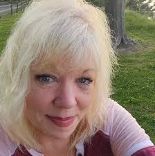 Frank Belluomini plays in the middle of State Street, causing a stir