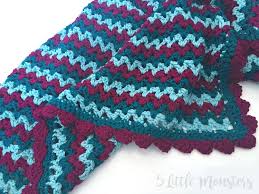 Learn with these amazing crochet blanket patterns that are absolutely beautiful! 5 Little Monsters Easy V Stitch Baby Blanket