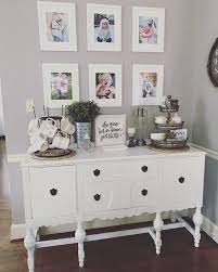 I Like The Pictures Above The Buffet Dining Room Buffet Table Dining Room Buffet Christmas Dining Room Decor