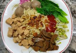 Masukkan bumbu antara lain, 2 sendok makan minyak ayam kedalam mangkok bersama dengan ¼ sendok teh penyedap rasa. Resep Mie Ayam Jamur