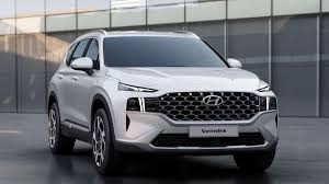 Press button and push down to lower. 2021 Hyundai Santa Fe Interior 5 Big Changes To Know About