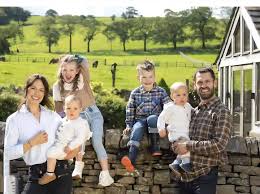 Kelvin Fletcher with his wife Elizabeth Marsland and their four ...