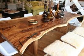 The most common wood slab dining table for 8 material is oak. Bon Appetit 10 Unique Dining Tables Rustic Wood Dining Room Tables Wood Dining Room Table Unique Dining Tables