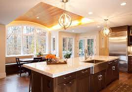 For virtually any room in the home, track lighting fixtures offer a stylish and versatile way to provide light. Creative Kitchen Decorations With Recessed Light On Curved Wood Ceiling And Using White Marble Countertop Pa Home Kitchens Kitchen Nook Lighting Kitchen Design