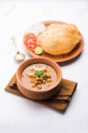 Every single thought about this dish takes me to the. Chole Bhature Or Chick Pea Curry And Fried Puri Served In Terracotta Stock Photo Picture And Royalty Free Image Image 102976848