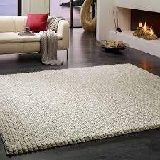 15 Ways To Add Knitted Decor To Your Winter Home Decorating Knit Decor Knit Rug Handmade Home Decor