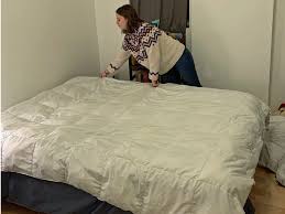 Does a duvet cover go over a comforter. How To Put On A Duvet Cover In Less Than 5 Minutes