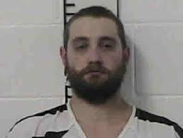 Three charged in woman's death