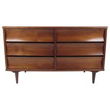 We striped and stained the wood to let the gorgeous wood grain shine through. Mid Century Modern Walnut Six Drawer Dresser By Johnson Carper For Sale At 1stdibs