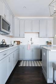 If you are considering wood flooring for the kitchen, you will have to take some precautions, and also keep in mind some of the other qualities of hardwood that for solid wood flooring, the general range of costs for materials alone is between $5 and $10 per square foot for standard domestic hardwoods. Black And White Stripe Turkish Kitchen Rug Design Ideas