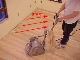 Sanding A New Hardwood Floor With A Rental Drum Sander Sanding Hardwood Floors Flooring