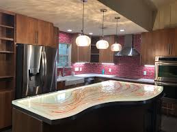 The purpose of a standard overhang (usually about 1 1/2 inches) is to prevent liquid spills from dribbling down the face of your cabinets and to keep crumbs from finding their way into the drawers and cupboards below. How Many Square Feet Of Countertop Are In An Average Kitchen Cbd Glass