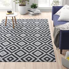 Machine made outdoor rugs are woven to withstand dirt, moisture, and heavy foot traffic while retaining their softness. Ebern Designs Iristine Black White Indoor Outdoor Area Rug Reviews Wayfair