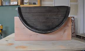 Use a level and tape measure to make sure the barrel is level and sits even. How To Build A Whiskey Barrel Coffee Table