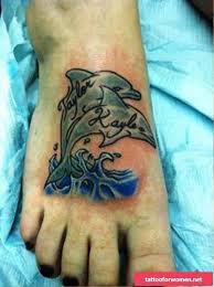 Dolphin tattoo with rose flower. Outstanding Dolphin Tattoos On Foot Elegant Dolphins Tattoo On Foot Tattoo Tattooforwomen Tattoodesign Tatt Foot Tattoos Dolphins Tattoo Friend Tattoos