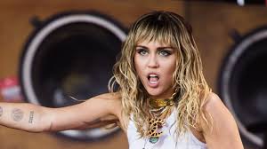 Miley cyrus, liam hemsworth have matching tattoos: Miley Cyrus Gets Freedom Tattoo Amid Liam Hemsworth Divorce Flipboard