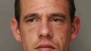 Man, 30, Charged with Impersonating an Officer