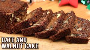Scatter with the remaining chopped walnuts and cut into 24 squares. Dates Walnut Cake How To Make Eggless Cake Easy Cake Recipe Christmas Special Varun Cooking Shows