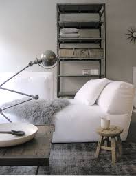 Crisp White Bed Gray Carpet Gray Throw Bedside Rustic Stool Rustic Table Old Articulated Desk Lamp Industrial Shelves Haus Deko Dekor Moderne Einrichtung