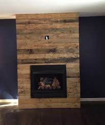Timber tiles wood look tile scandinavian home porcelain tile real wood gold coast wall tiles building a house entryway tables. How To Create A Diy Reclaimed Wood Fireplace Surround For Less Than 100 Grand Rapids Interior Design Fuchsia Design