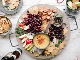 Table served with middle eastern vegetarian dishes. The Stress Free Guide To Hosting Your First Dinner Party