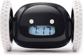 It is cold in the room. Amazon Com Clocky Alarm Clock On Wheels Original Extra Loud For Heavy Sleeper Adult Or Kid Bed Room Robot Clockie Funny Rolling Run Away Moving Jumping Black Home Kitchen
