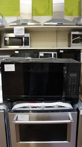 Center the microwave over the range and ensure that the microwave's bottom is at least 30 inches above the cooktop. 1 9 Cu Ft Samsung Me19r7041fs Over The Range Microwave Oven Appliances Tv Outlet