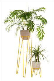 Diy mid century modern plant stand/ planter. These 13 Modern Plant Stands Put Your Favorite Plants On Display