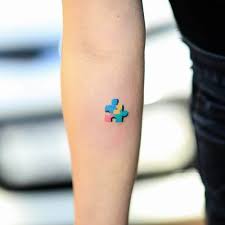 Autism banner puzzle tattoo on foot. Top 103 Best Autism Tattoos 2021 Inspiration Guide