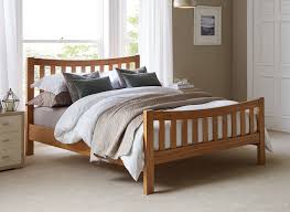 Types Of Wooden Beds Designs For Blissful Nights Designalls In 2020 Wooden Bed Frames Brown Wooden Bed Bed Frame
