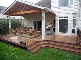 A covered area does not have to be an outdoor kitchen. Covered Deck Ideas For Your Home Amazing Designs Backyard Work